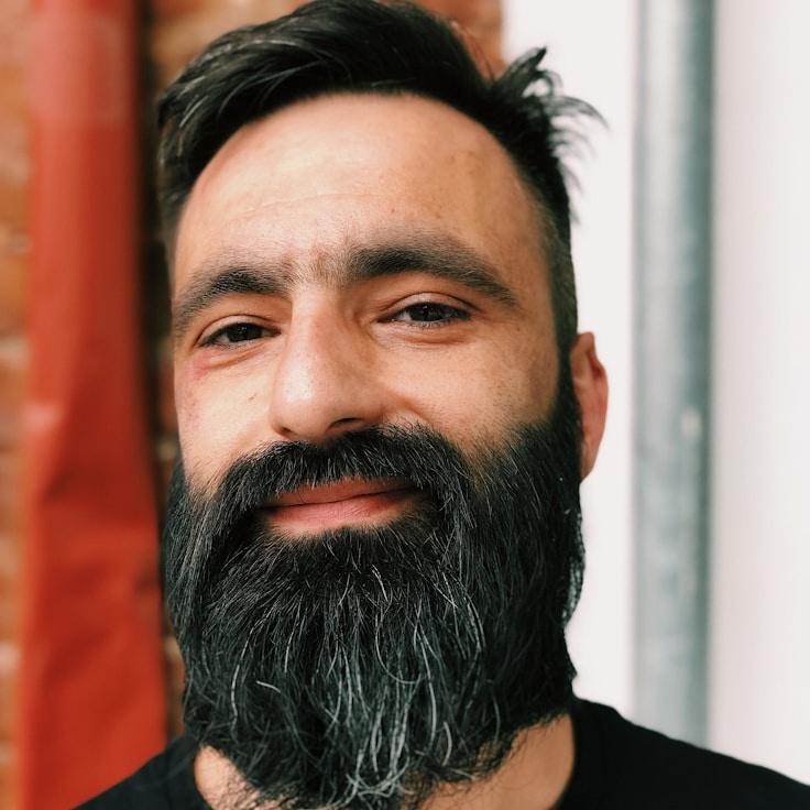 Portrait of Zephyr, group coordinator and fusion cooking expert